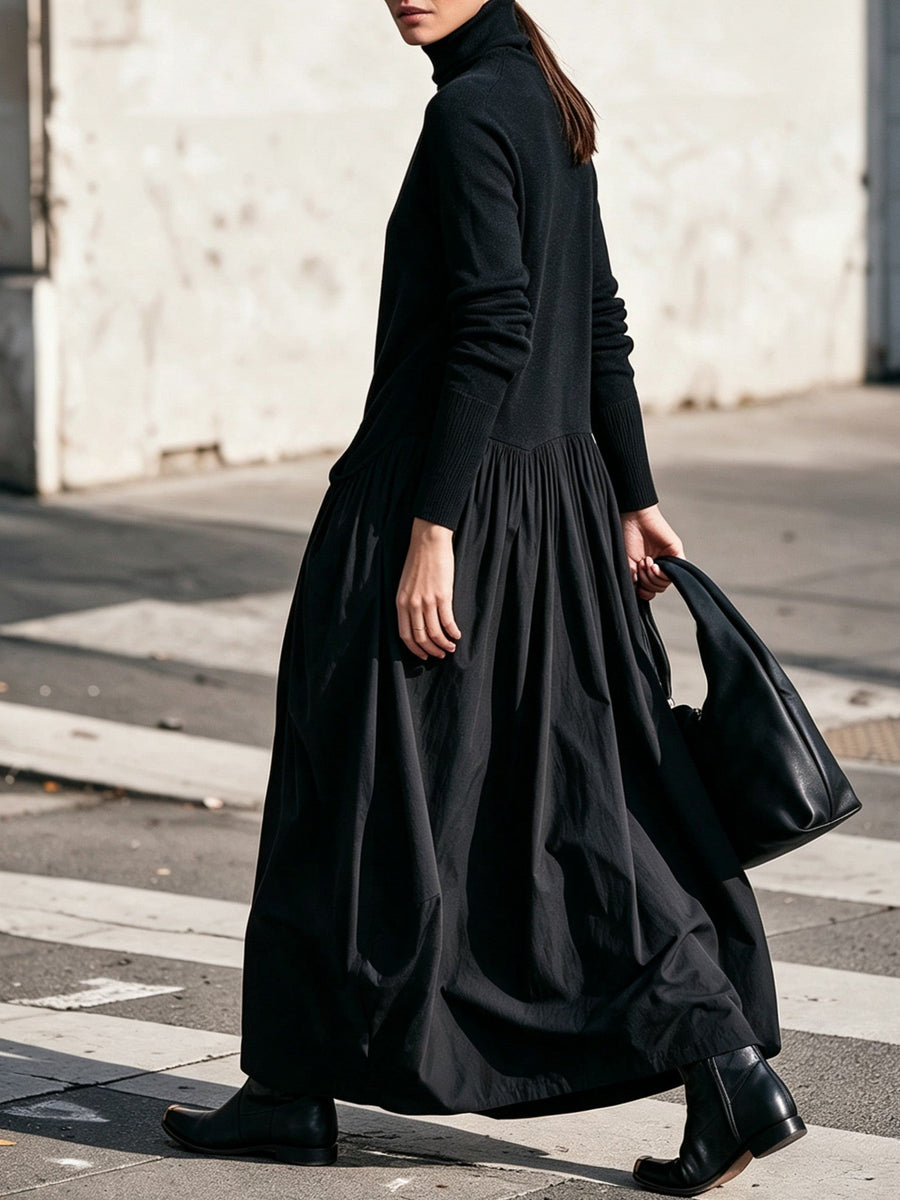 Celinne- Abito lungo oversize nero con collo alto e tasche decorative